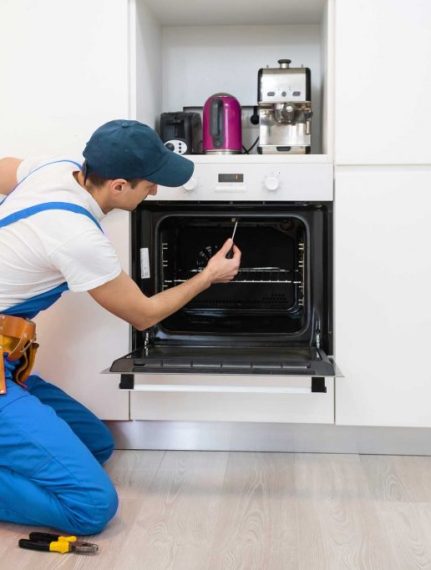 man repairing oven - About Expert Appliance Repair Staten Island - Oven Repair Staten Island